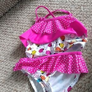 Little girl two pieces swim wear. Barely worn